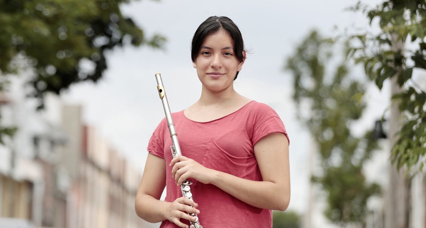 Ariadna Rosas photographed with her flute for ACOSA 2020