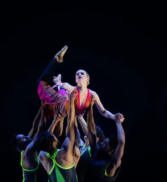 BalletX dancers Jerard Palazo, Jared Kelly, Shawn Cusseaux, and Ben Schwarz lift Skyler Lubin in Amy Hall Garner's "Switching the Groove."