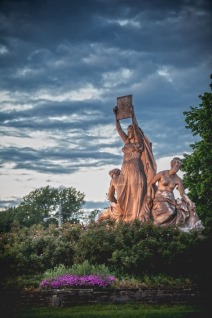 Law, Prosperity, and Power Statue